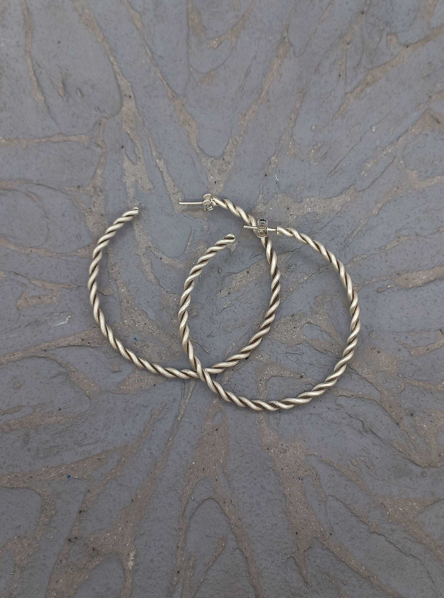 Twist silver hoops