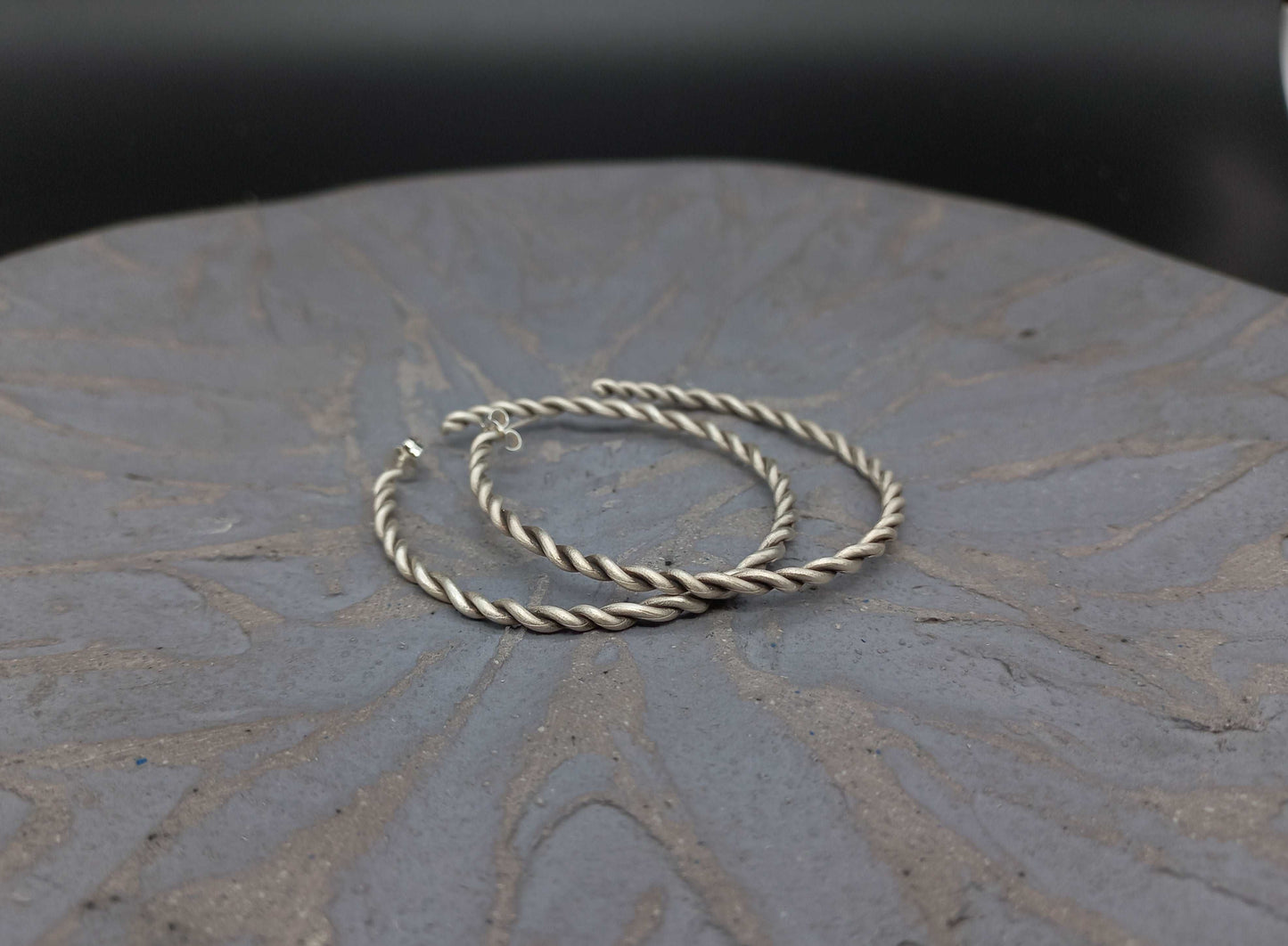 Twist silver hoops