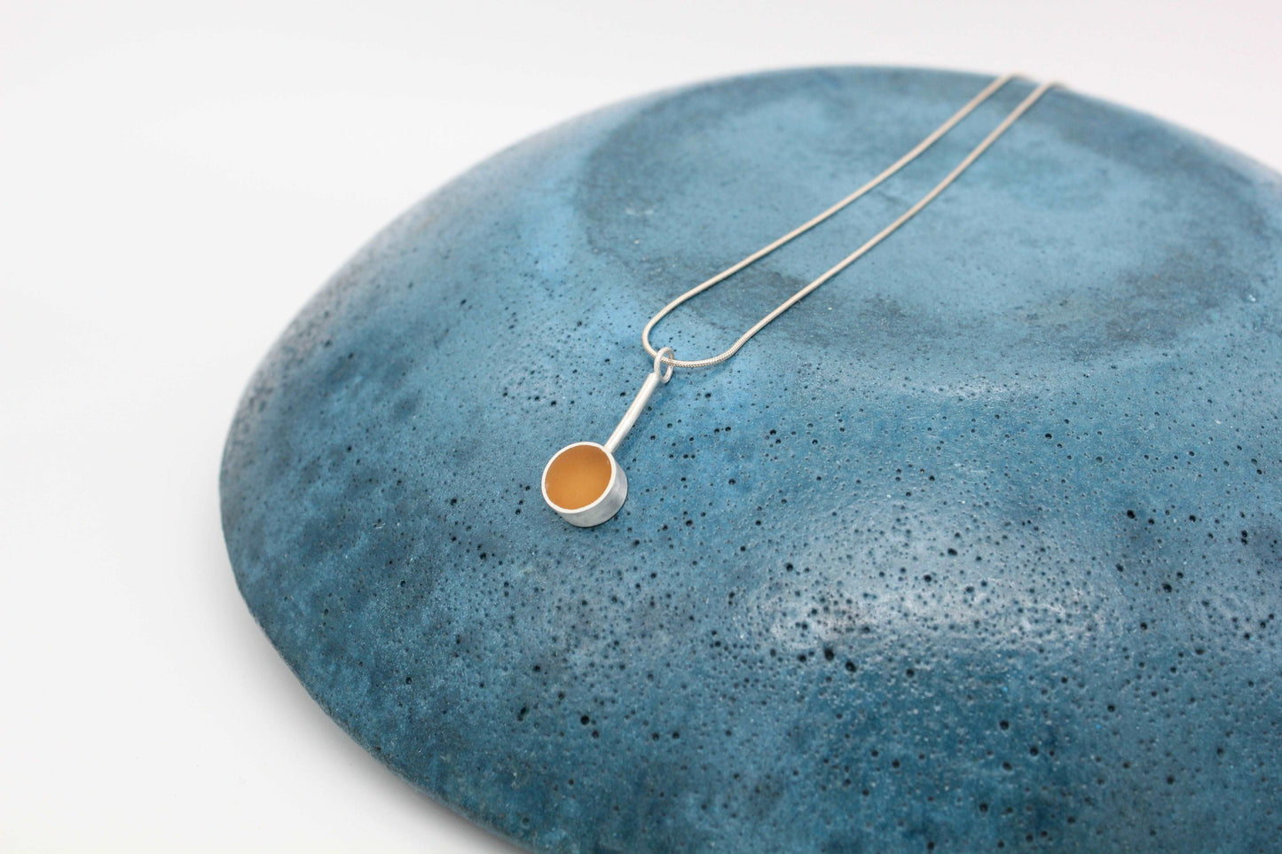 Yellow ochre round shape pendant