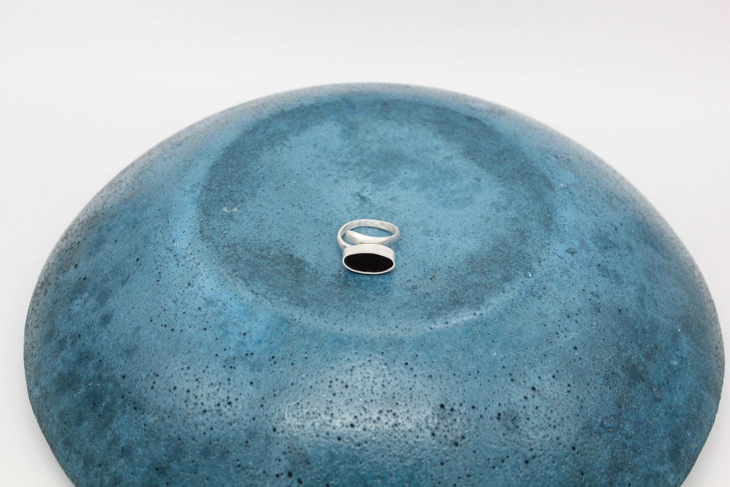 Black oval shape ring