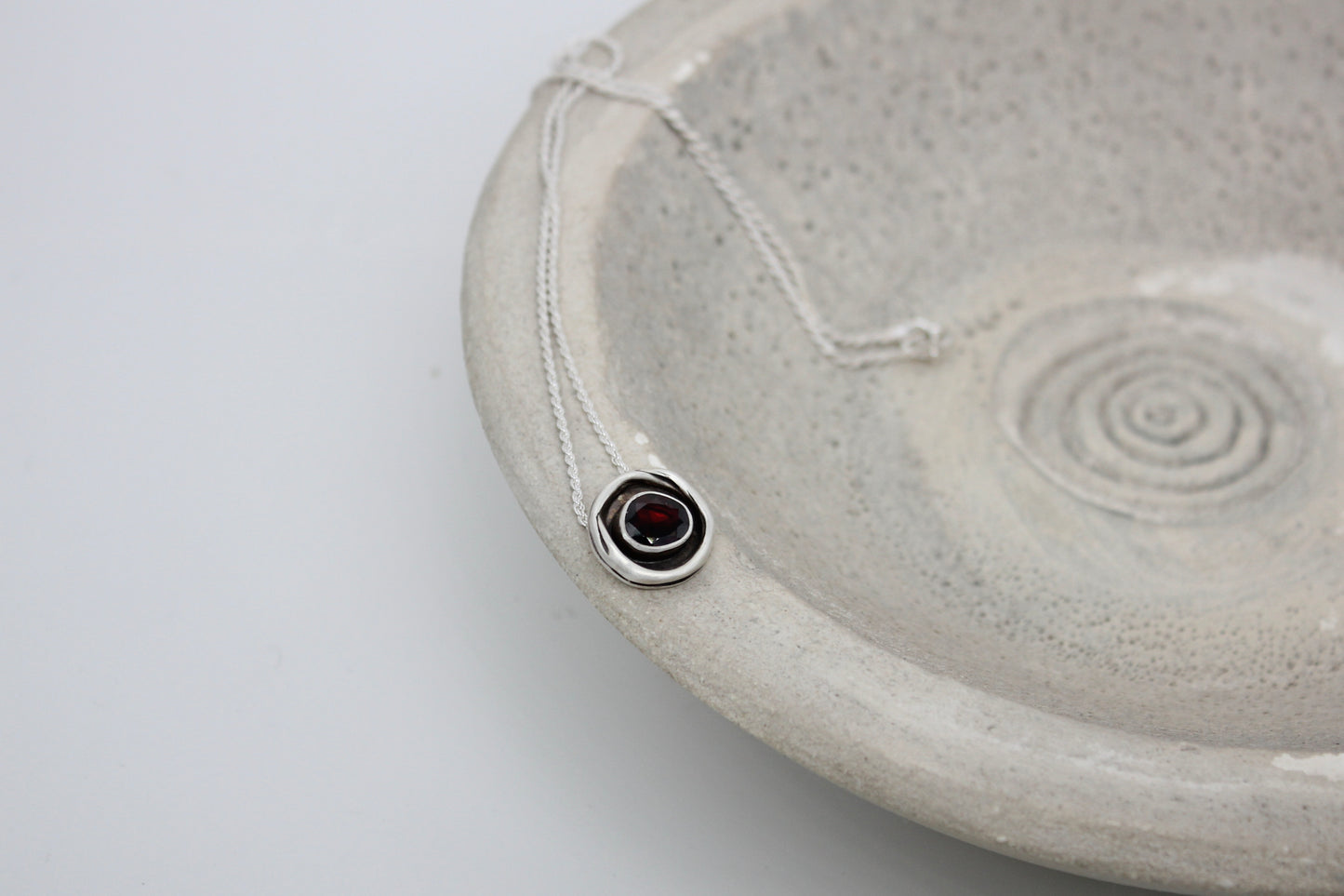 One of a kind sterling silver pendant with garnet