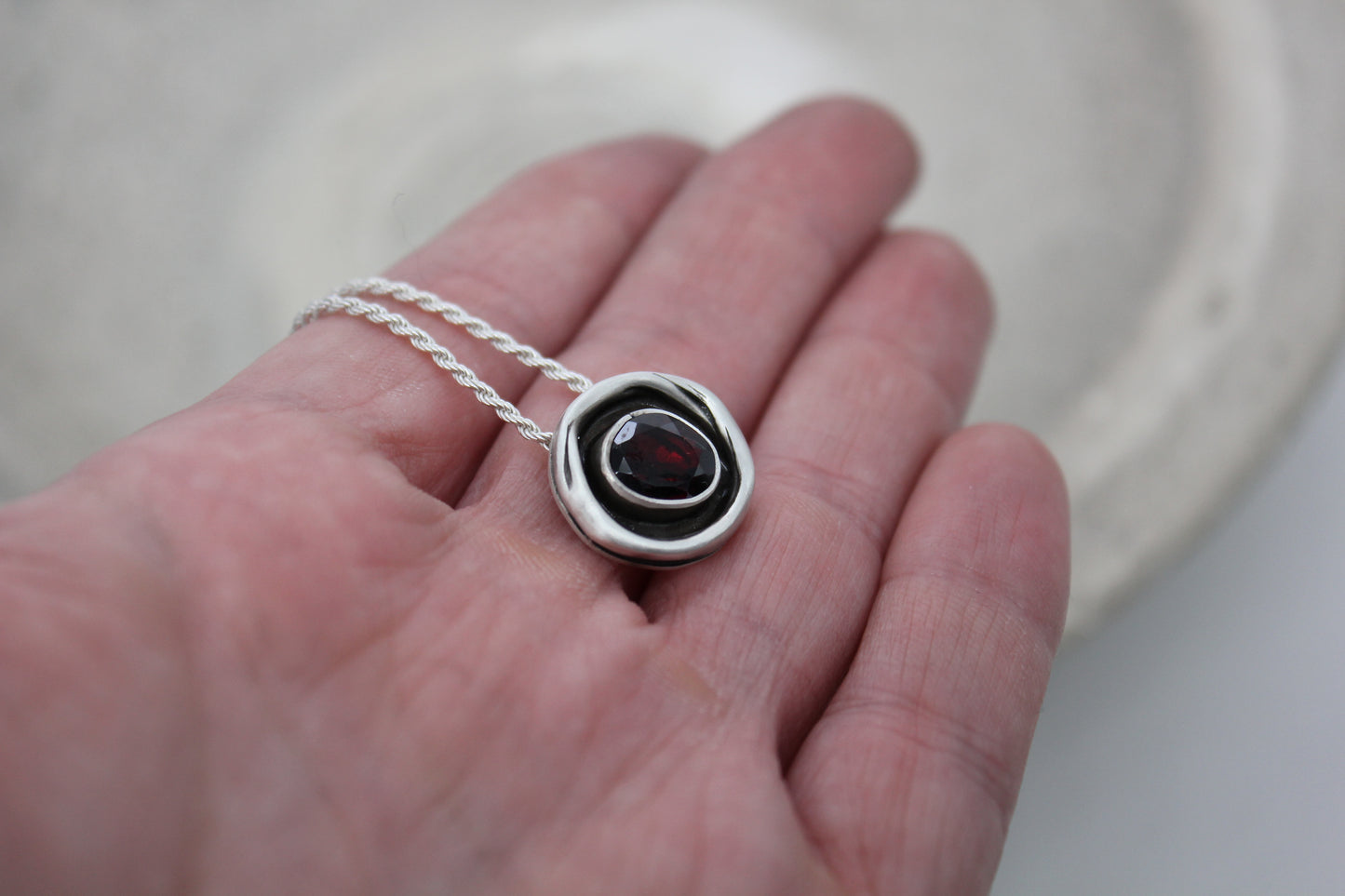One of a kind sterling silver pendant with garnet