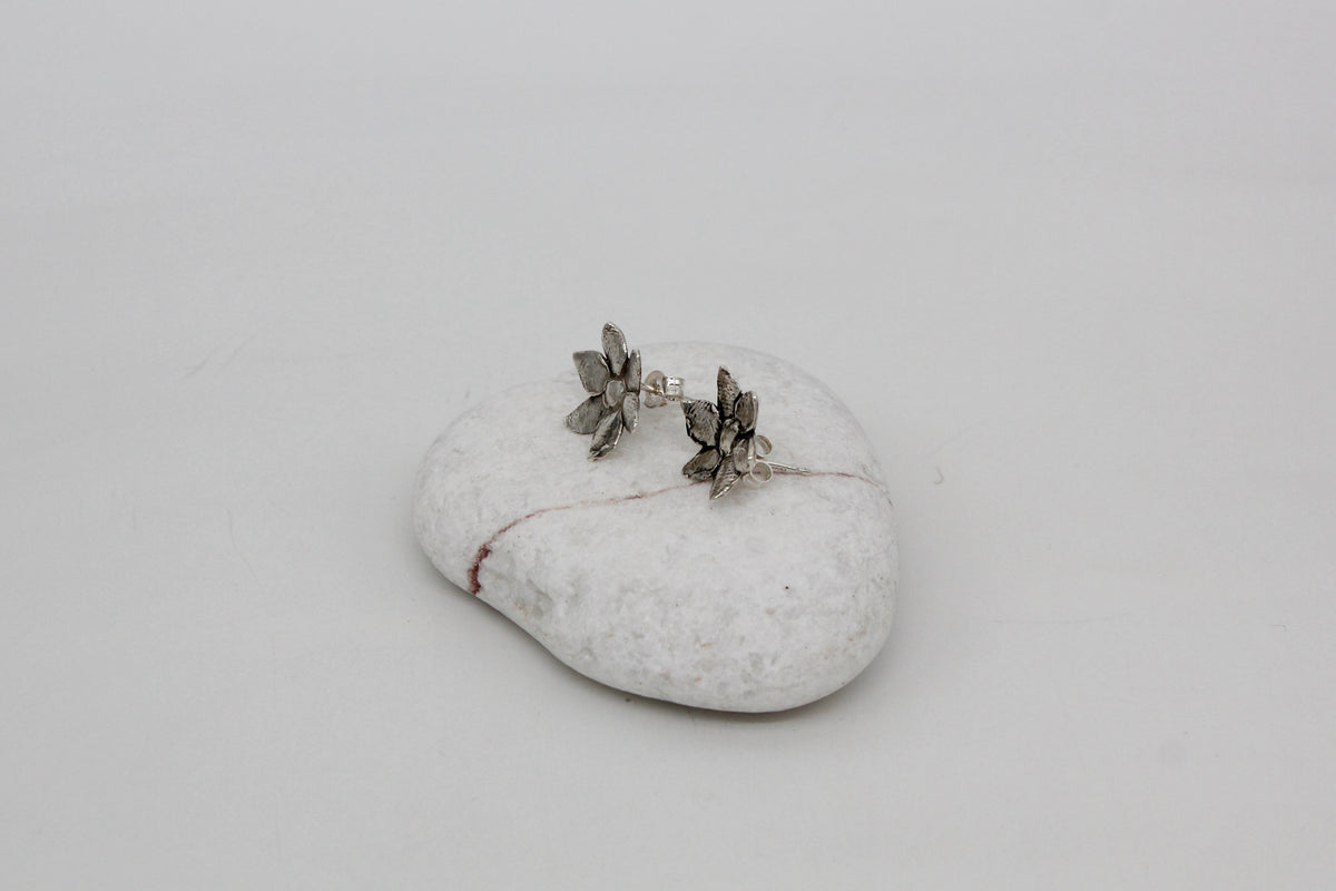 Handmade sterling silver flowers