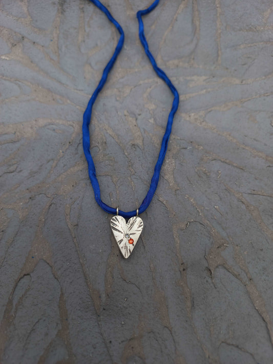 Pointed silver heart pendant orange and blue