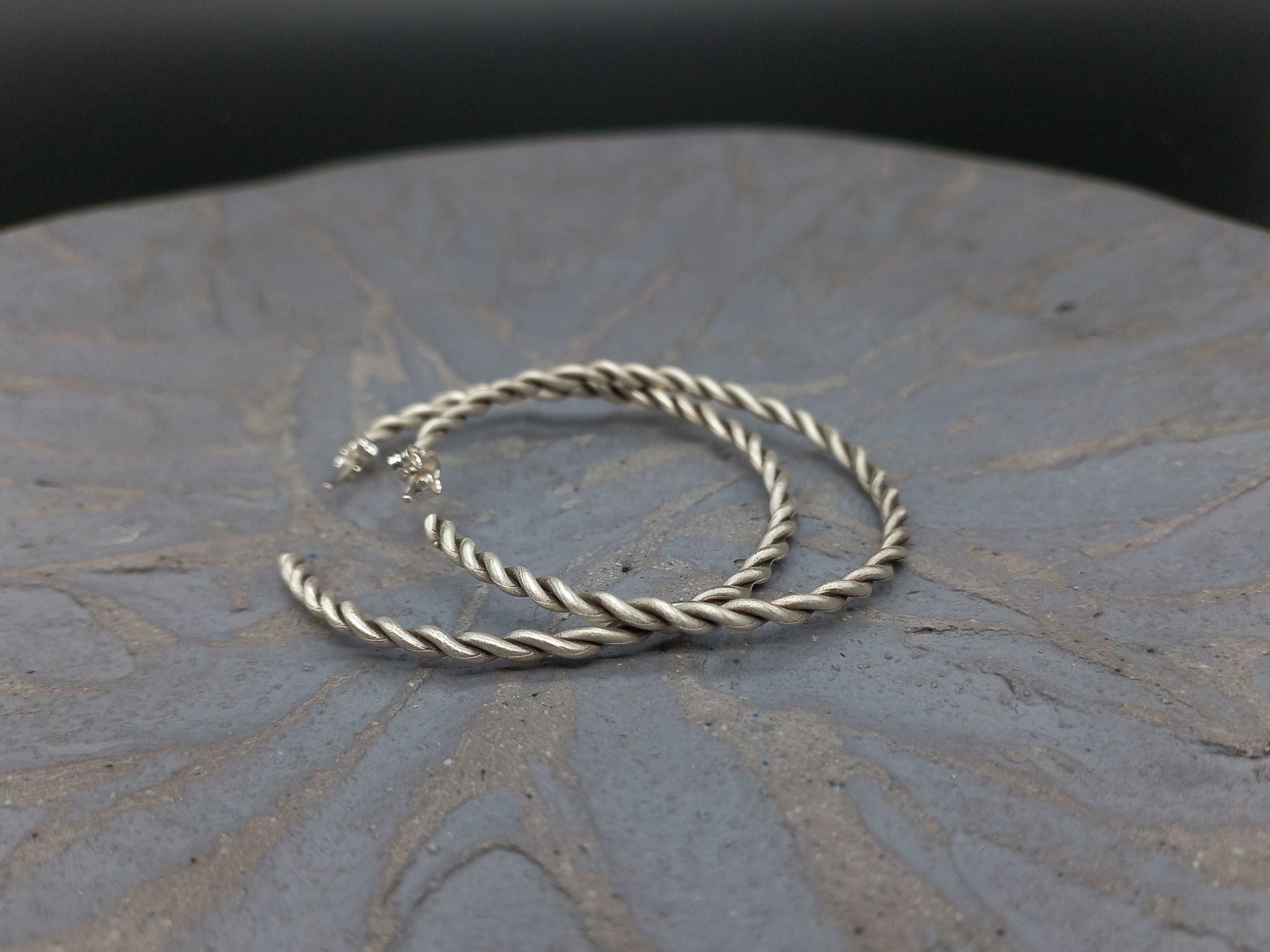 Twist silver hoops