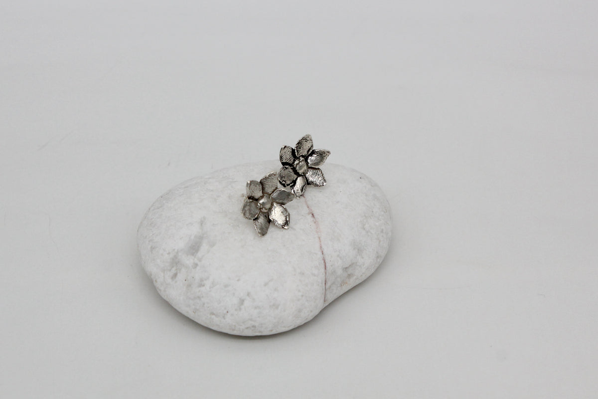 Handmade sterling silver flowers