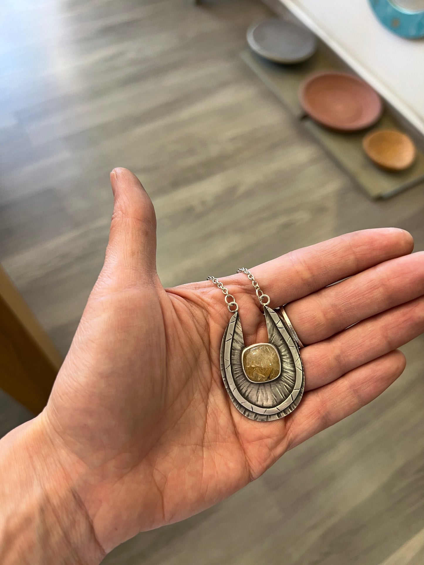 One og a kind rutilated quartz pendant