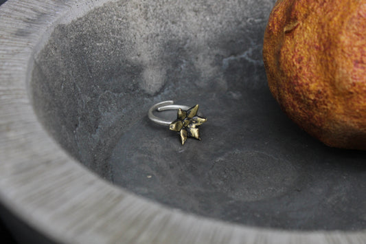 Sterling silver ring with brass flower