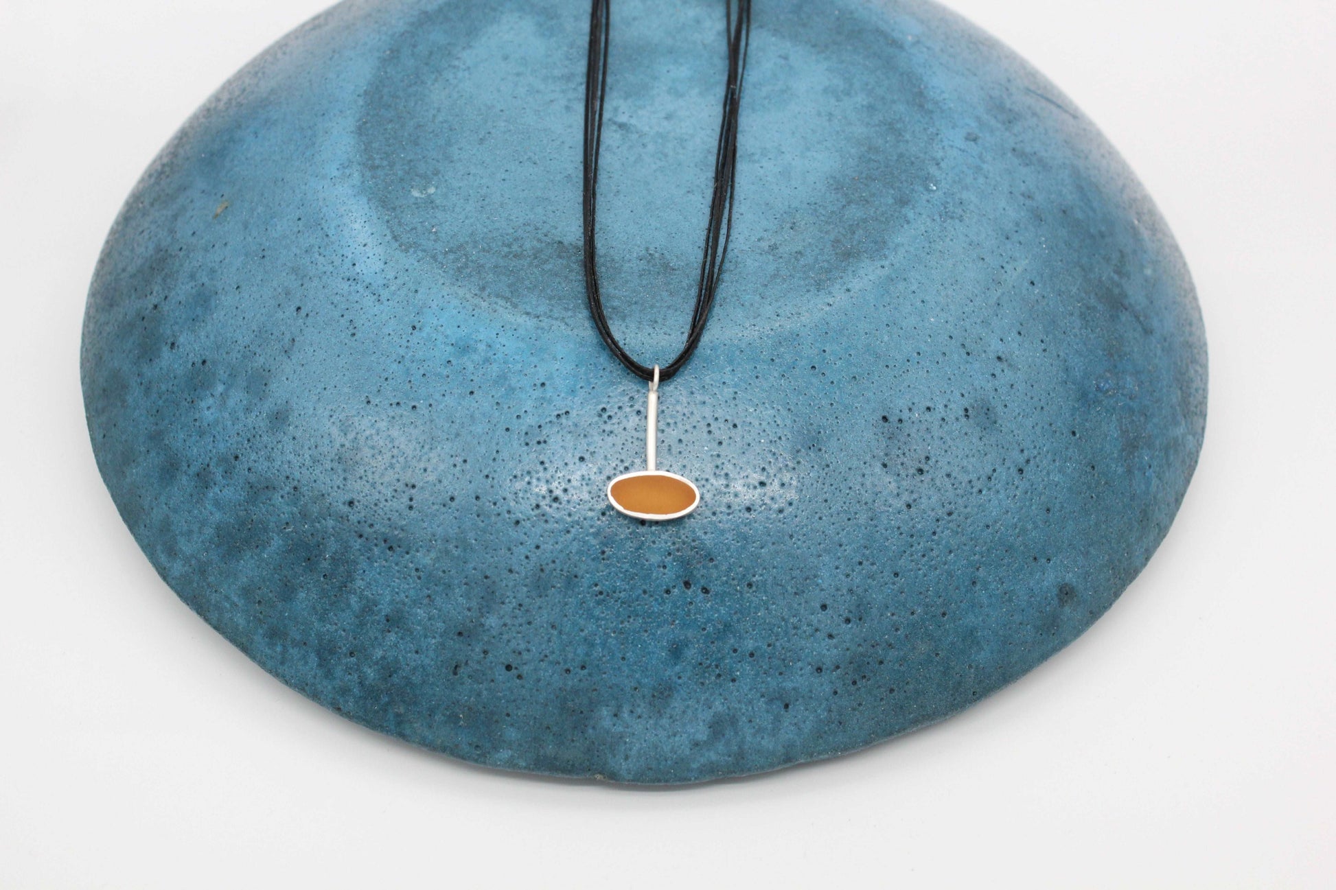 Yellow ochre oval shape pendant