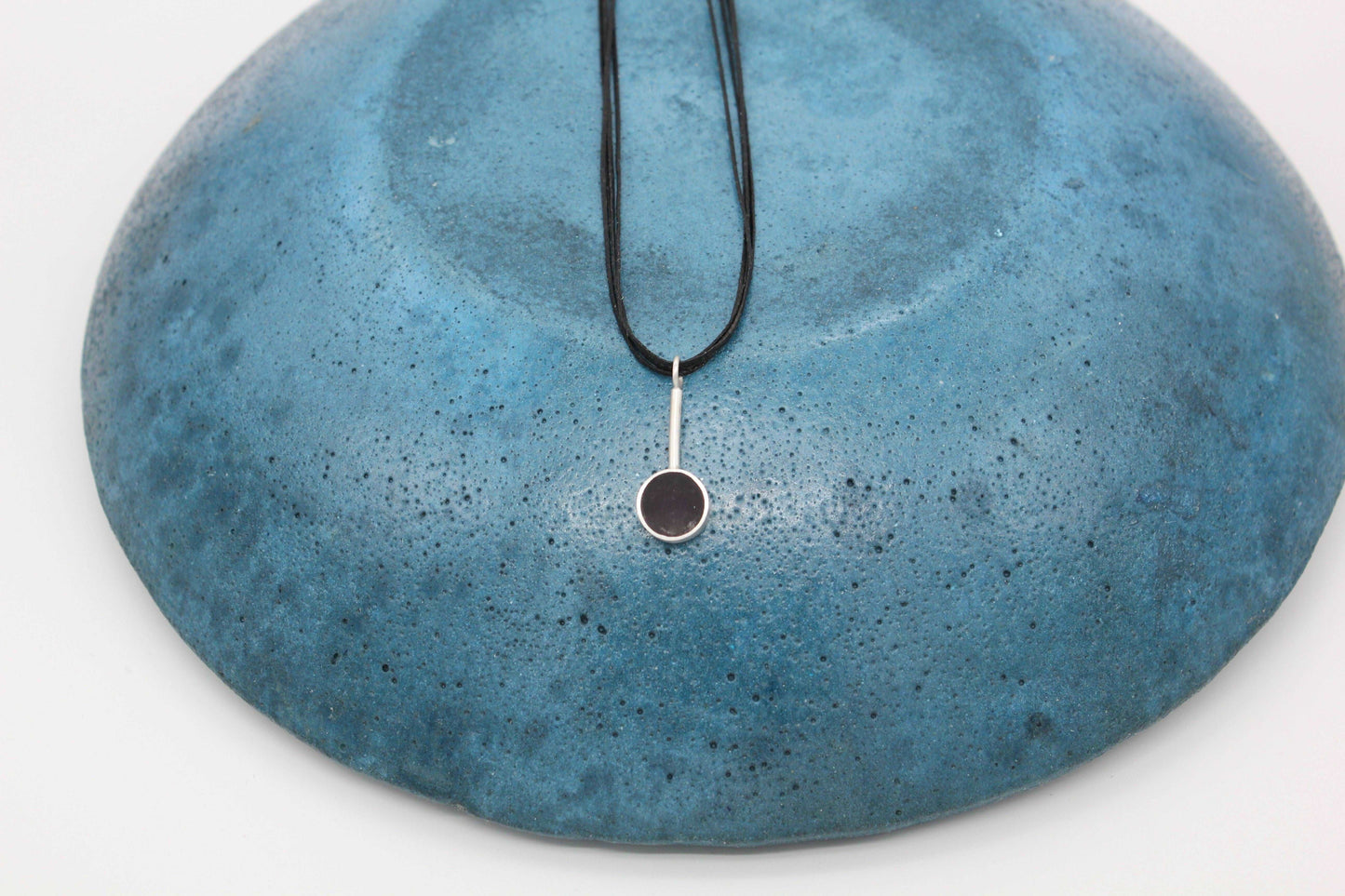 Black round shape pendant