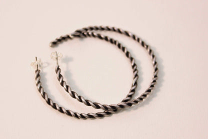 Twist silver hoops